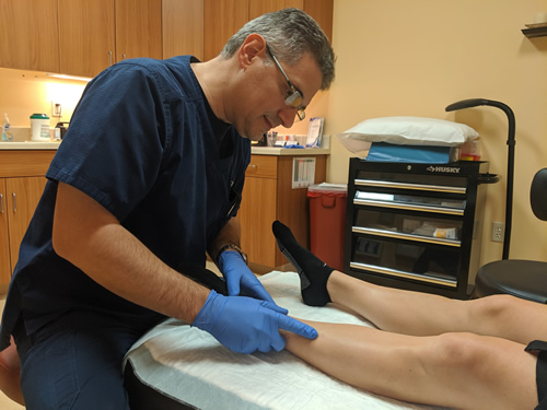 Dr-Sabatino-with-patient Dr. Sabatino with patient